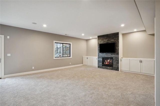 3037 Dell Ridge Ct, Hiawatha, IA 52233 - unfurnished living room featuring carpet, recessed lighting, a fireplace, and baseboards