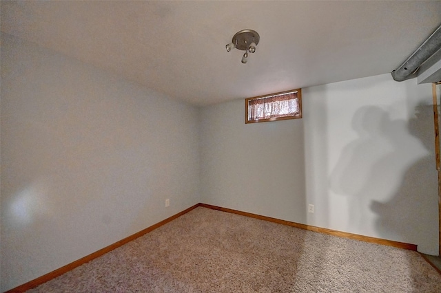 basement with carpet flooring