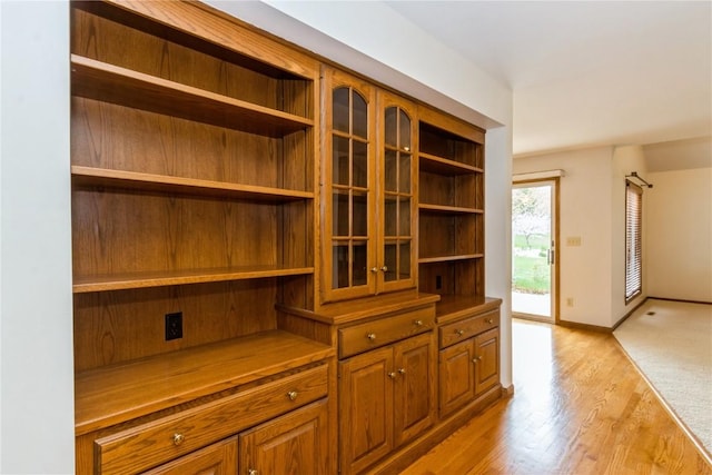 interior details with wood finished floors and baseboards