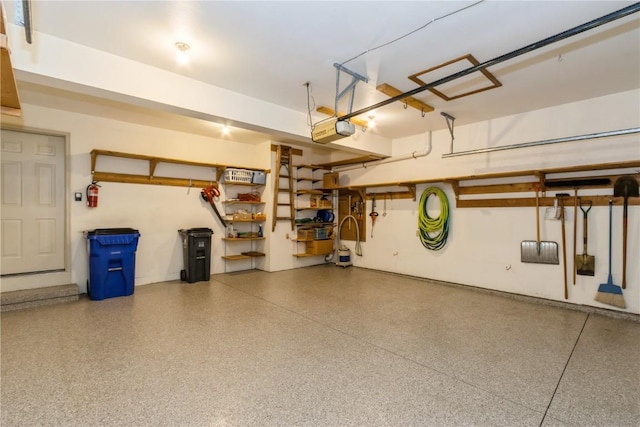 garage featuring a garage door opener