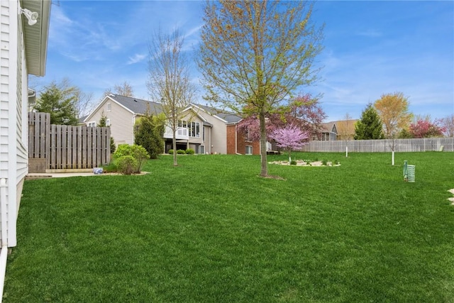 view of yard featuring fence