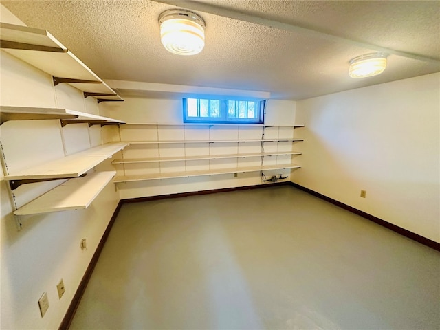 basement with a textured ceiling