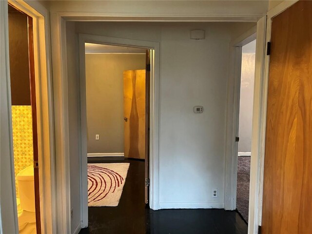 202 N Williams St, Anamosa, IA 52205 - hallway featuring baseboards