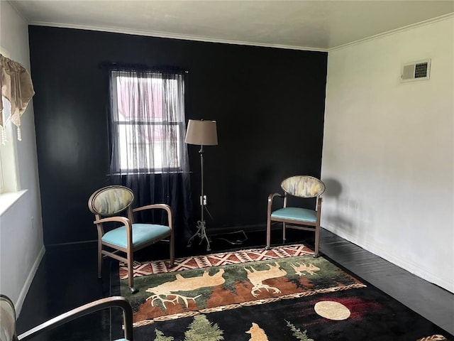 202 N Williams St, Anamosa, IA 52205 - sitting room featuring ornamental molding and baseboards