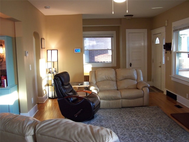 living room with light hardwood / wood-style flooring