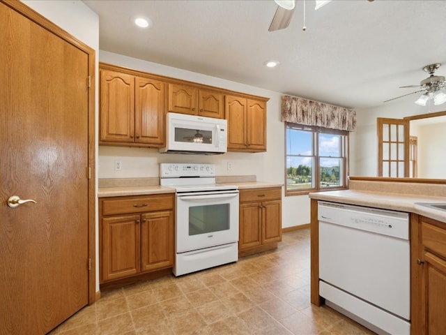 kitchen with ceiling fan and white appliances