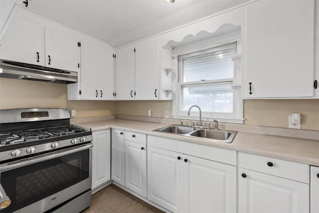 kitchen featuring sink, white cabinets, and stainless steel range with gas stovetop