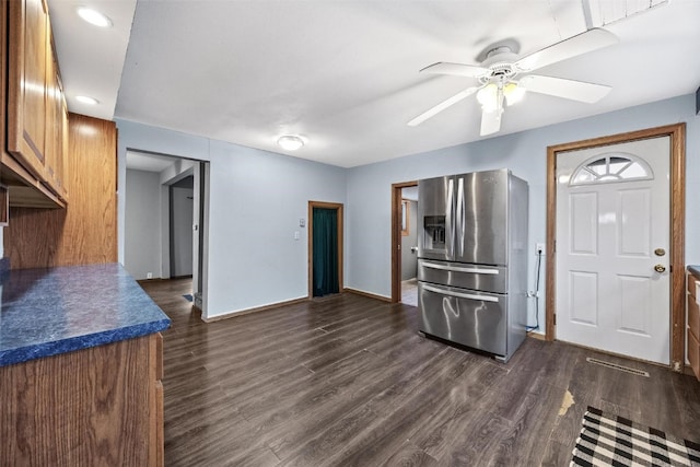 entrance foyer with dark hardwood / wood-style floors and ceiling fan