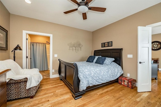 bedroom featuring ceiling fan and light wood-type flooring