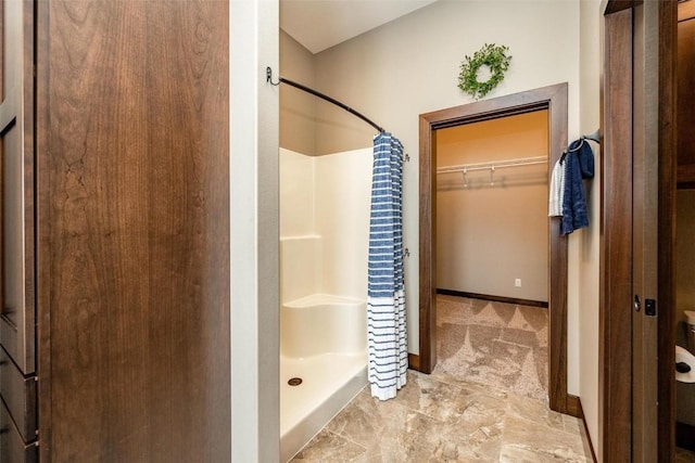 bathroom featuring walk in shower