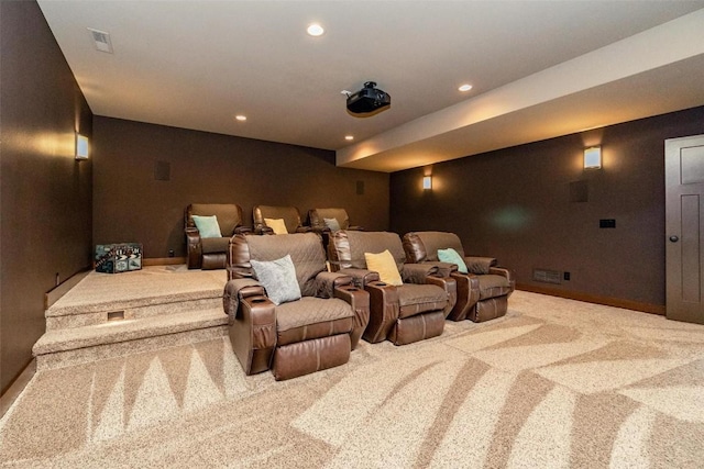 home theater room featuring light colored carpet