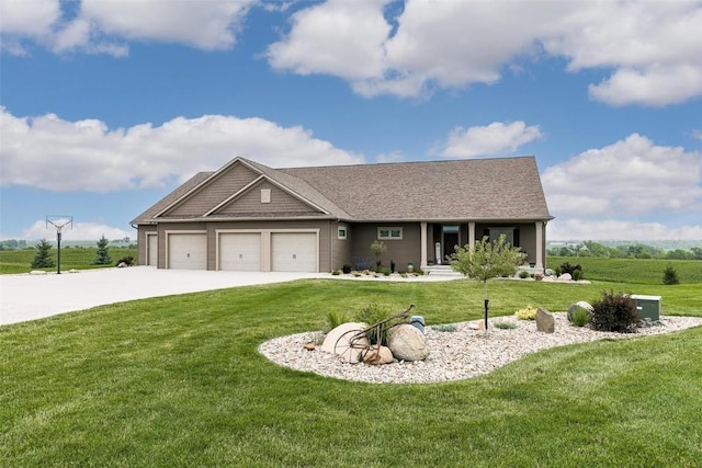 view of front facade with a garage and a front yard