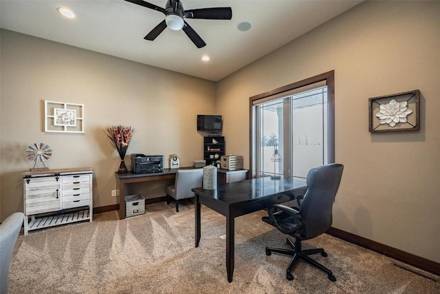 office space with ceiling fan and carpet