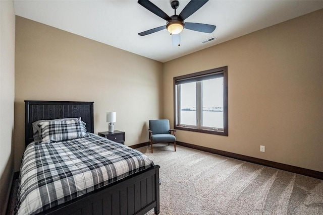 carpeted bedroom with ceiling fan