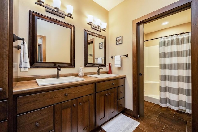 bathroom with shower / tub combo with curtain and vanity