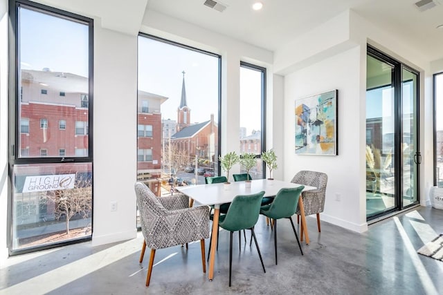 dining area with concrete floors