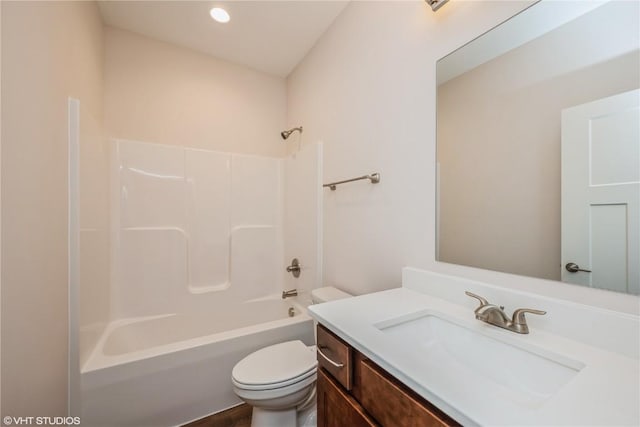 full bathroom with vanity, tub / shower combination, and toilet