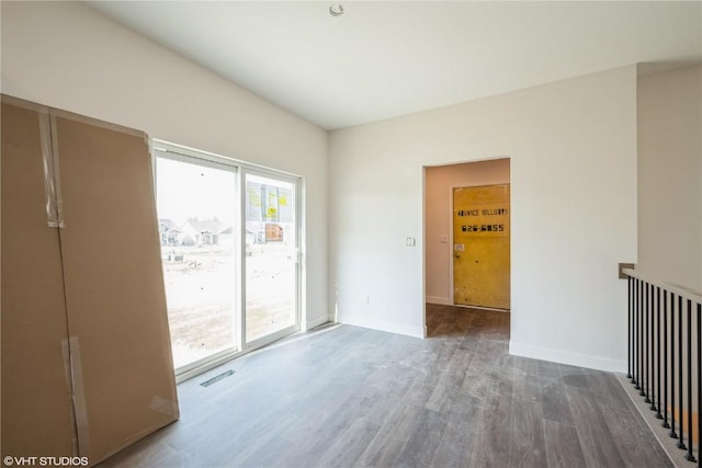2362 Bluegrass St, Marion, IA 52302 - empty room featuring wood finished floors and baseboards