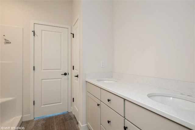 2362 Bluegrass St, Marion, IA 52302 - full bath featuring double vanity and wood finished floors