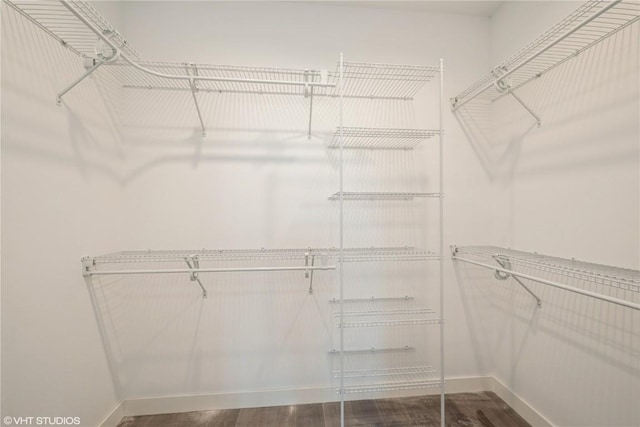 2362 Bluegrass St, Marion, IA 52302 - walk in closet featuring wood finished floors