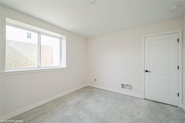2362 Bluegrass St, Marion, IA 52302 - spare room with a smoke detector and baseboards