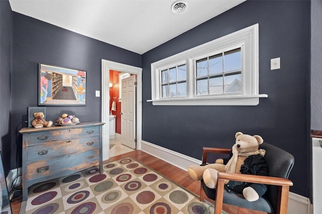 living area featuring wood-type flooring