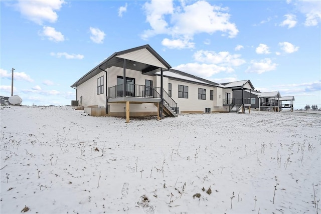 view of snow covered house