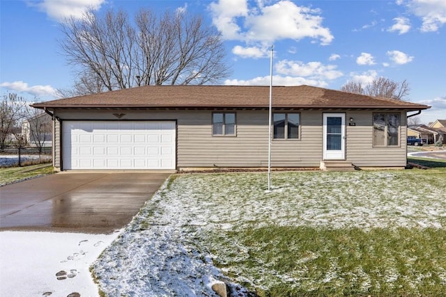 ranch-style home featuring a garage