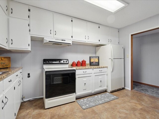 kitchen with white cabinets and white appliances