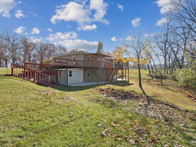 view of yard with a patio and a wooden deck