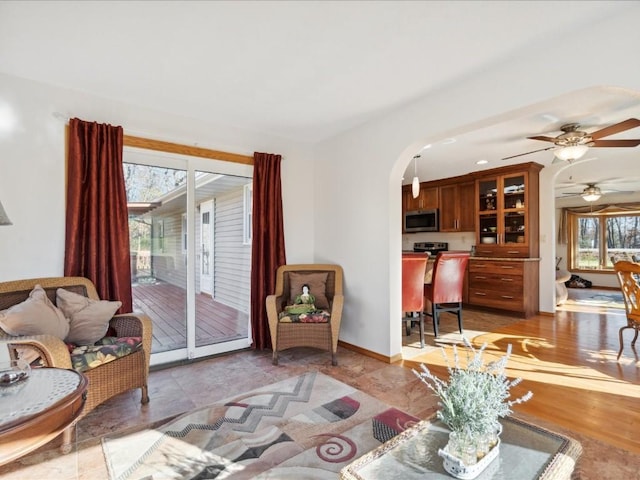 living room with ceiling fan