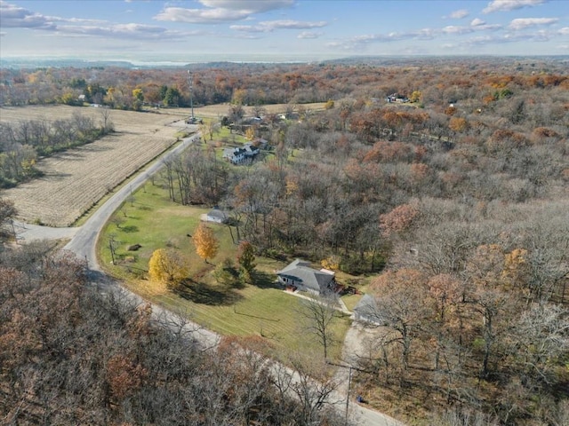 birds eye view of property featuring a rural view