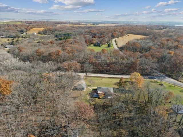 birds eye view of property featuring a rural view