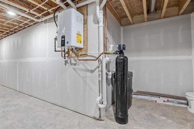 utility room featuring water heater