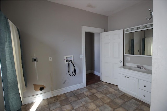 bathroom with vanity and walk in shower