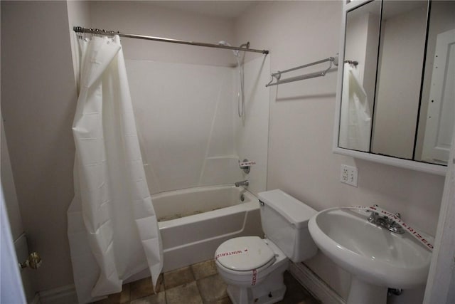 full bathroom with toilet, sink, and shower / tub combo