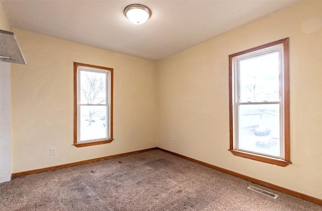 spare room with carpet flooring