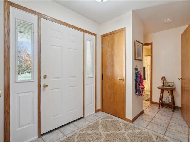 view of tiled foyer entrance