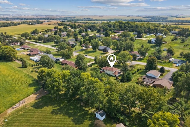 birds eye view of property featuring a rural view