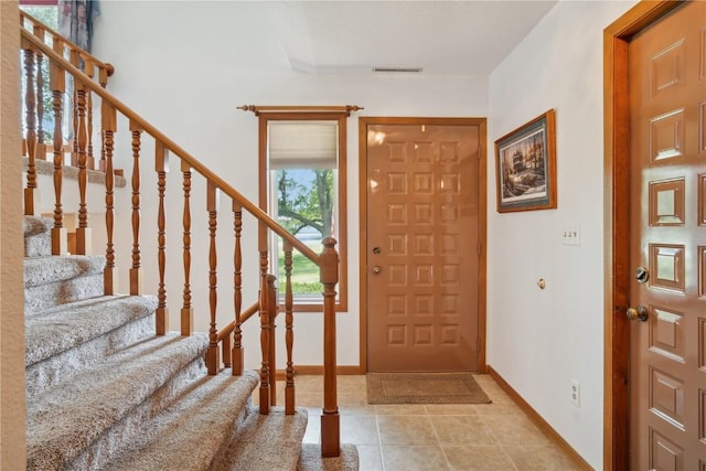 view of tiled foyer entrance