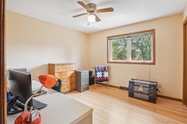 office area featuring light hardwood / wood-style floors and ceiling fan