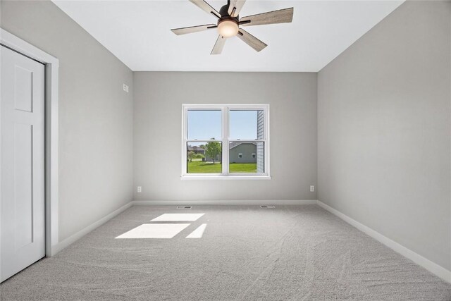 1596 Connection Ave, Marion, IA 52302 - unfurnished room featuring carpet flooring, baseboards, and ceiling fan