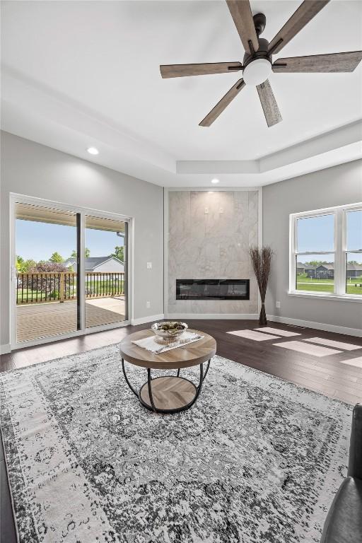 1596 Connection Ave, Marion, IA 52302 - living area with ceiling fan, baseboards, wood finished floors, plenty of natural light, and recessed lighting