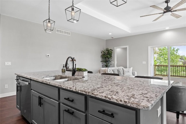 1596 Connection Ave, Marion, IA 52302 - kitchen featuring a sink, gray cabinets, stainless steel dishwasher, a center island with sink, and recessed lighting