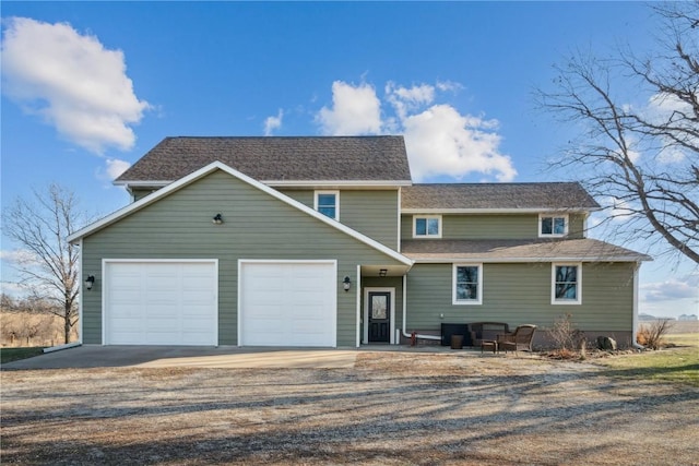 view of property with a garage