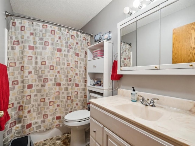 bathroom featuring a textured ceiling, vanity, toilet, and walk in shower