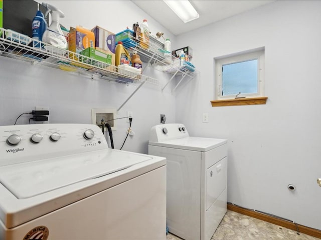 washroom featuring separate washer and dryer