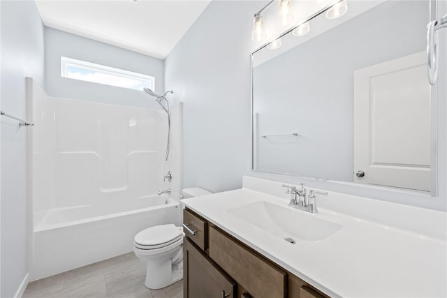 full bathroom with vanity, toilet, lofted ceiling, and bathing tub / shower combination