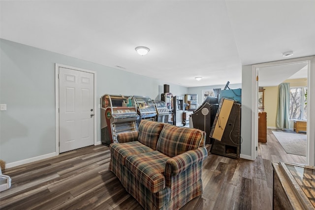 living room with wood finished floors and baseboards