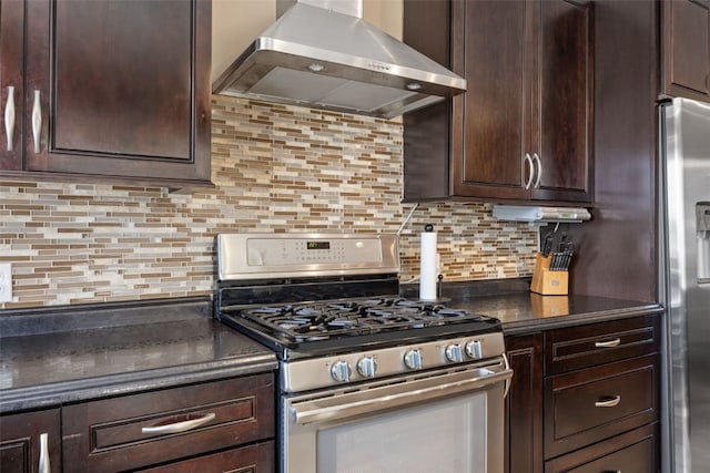 kitchen with tasteful backsplash, dark brown cabinets, appliances with stainless steel finishes, and range hood